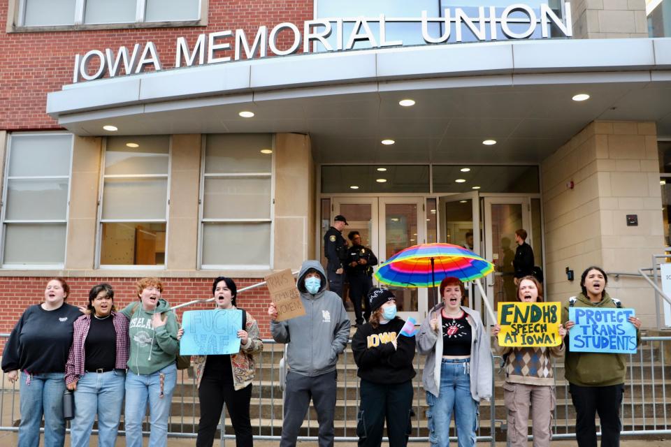 A small group of protesters gathered outside the Iowa Memorial Union around an hour before Paula Scanlan, a former teammate of transgender swimmer Lia Thomas, spoke as a guest of the University of Iowa chapter of Young Americans for Freedom on Monday, March 25, 2024 in Iowa City, Iowa.