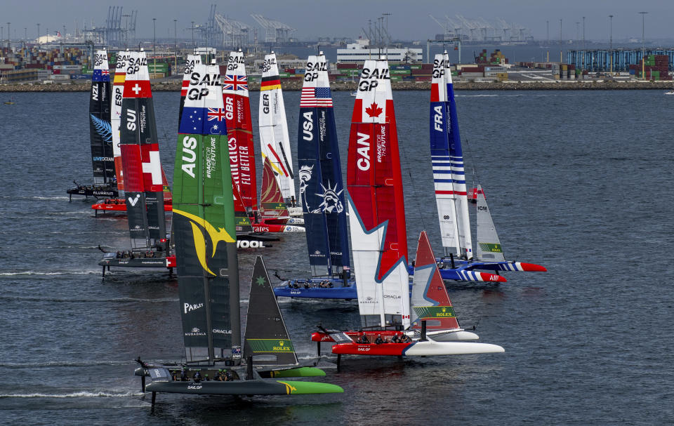 In this photo provided by Sail GP, the SailGP fleet races on day one of the Los Angeles Sail Grand Prix at the Port of Los Angeles, Saturday, July 22, 2023. (Ricardo Pinto/SailGP via AP)