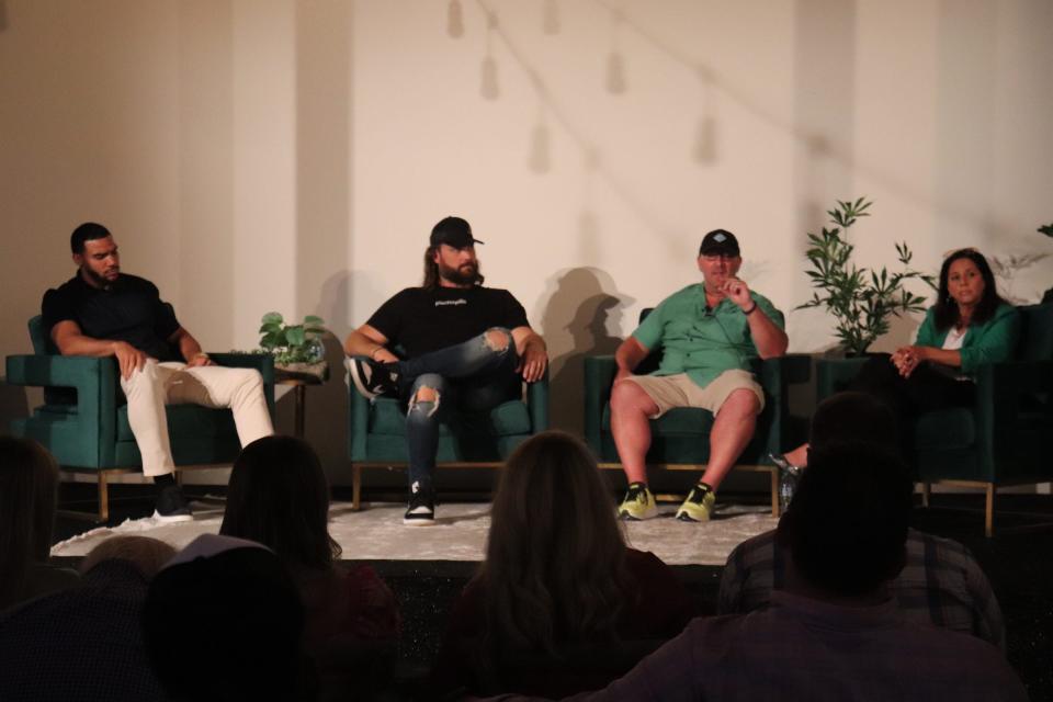 Jordan Reed, David Belsky, Josh Joseph and Tara Joseph (left to right) sitting before the audience attending the Nashville Cannabis Live Chat at Ozari in Nashville on June 8, 2022.