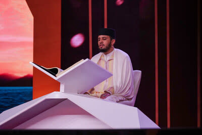 The German contestant, Salahuddin Mutabid, reciting Quran in Otr Elkalam competition in Saudi Arabia.