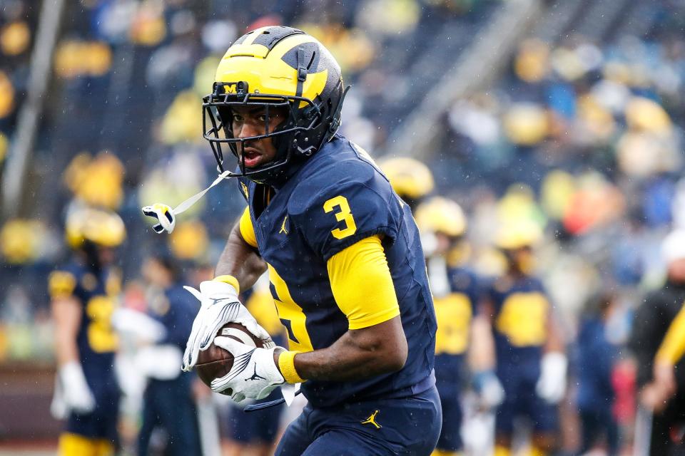Michigan wide receiver Fredrick Moore (3) warms up before the Indiana game at Michigan Stadium in Ann Arbor on Saturday, Oct. 14, 2023.