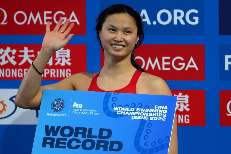 Canada's Maggie Mac Neil celebrates after breaking her own short-course world record in the women's 50-metre backstroke at the 2022 world championships in Melbourne, Australia. (Quinn Rooney/Getty Images - image credit)