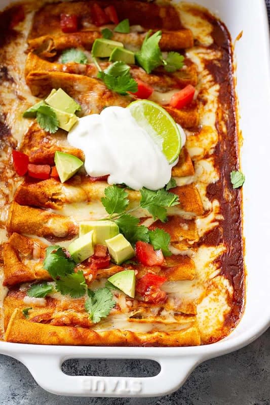 <p>Corn tortillas are filled with Monterey jack cheese and topped with a homemade red enchilada sauce.</p><p><strong>Get the recipe: <a href="https://www.countrysidecravings.com/cheese-enchiladas/" rel="nofollow noopener" target="_blank" data-ylk="slk:Easy Cheese Enchiladas;elm:context_link;itc:0;sec:content-canvas" class="link ">Easy Cheese Enchiladas</a></strong></p>