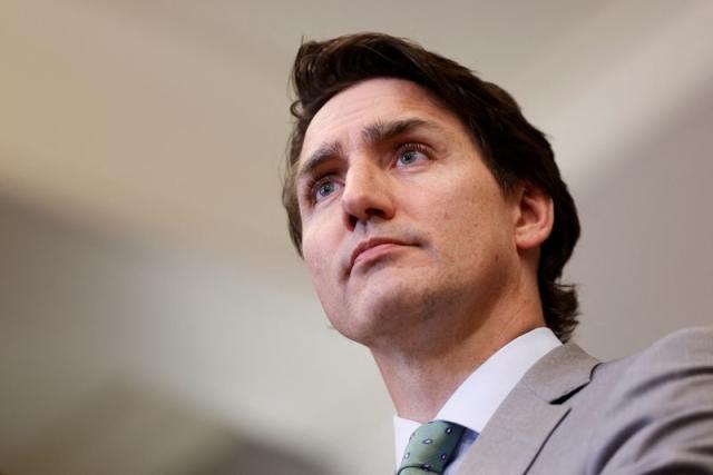 FILE PHOTO: Canada's Prime Minister Justin Trudeau holds a press conference in response to the release of a special report on foreign interference, on Parliament Hill in Ottawa