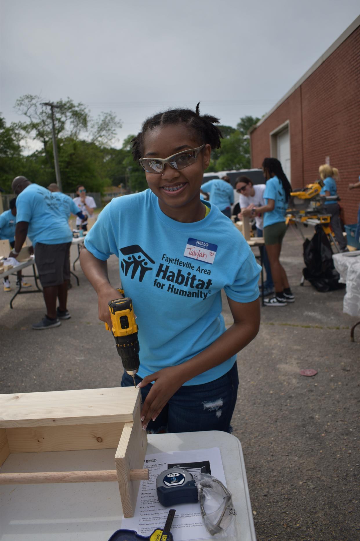 Young people in Trade Days learn the skills of home repair and tool safety. The program is a partnership between Fayetteville Area Habitat for Humanity and Cumberland County Schools.
