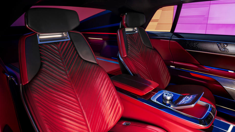 The interior, comprising materials crafted by hand, features reclining executive seats at the back. - Credit: Cadillac