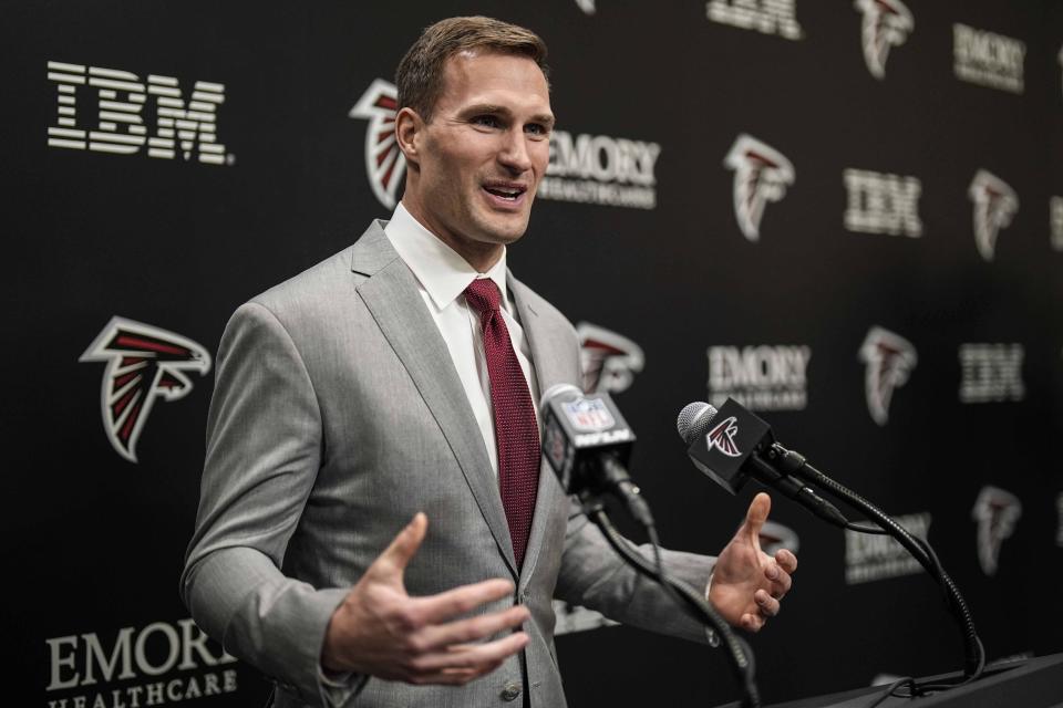 Atlanta Falcons quarterback Kirk Cousins speaks during a news conference Wednesday, March 13, 2024, in Flowery Branch, Ga. Cousins has one playoff victory in his long career. The Falcons are betting at least $100 million that he's the guy who can lead them to the first Super Bowl title in franchise history. (AP Photo/Mike Stewart)