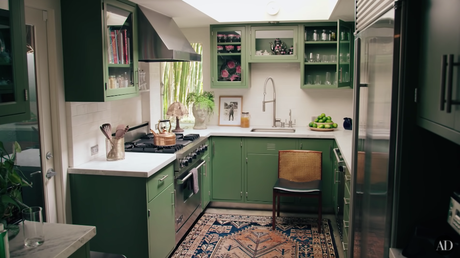 Another image of green-themed kitchen