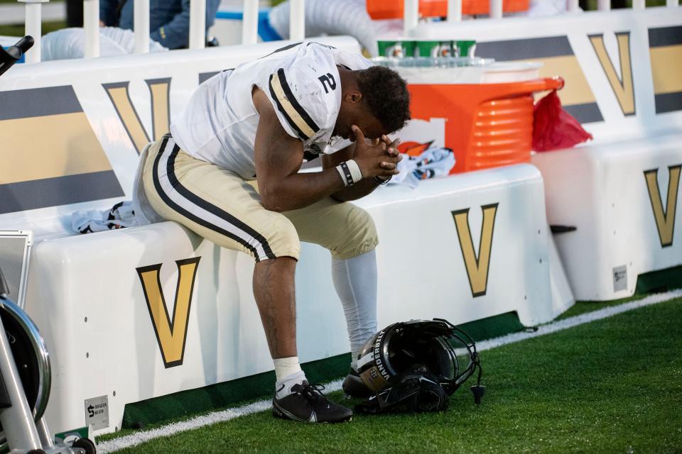 Vanderbilt running back Ray Davis sits dejected on the bench after losing 17-14 to Missouri in an NCAA college football game Saturday, Oct. 22, 2022, in Columbia, Mo. (AP Photo/L.G. Patterson)