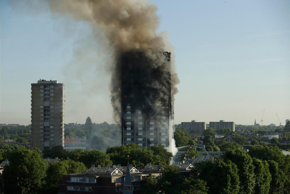 Smoke billows from Grenfell Tower in London in the wake of the tragic blaze (AP Photo/Matt Dunham, file)