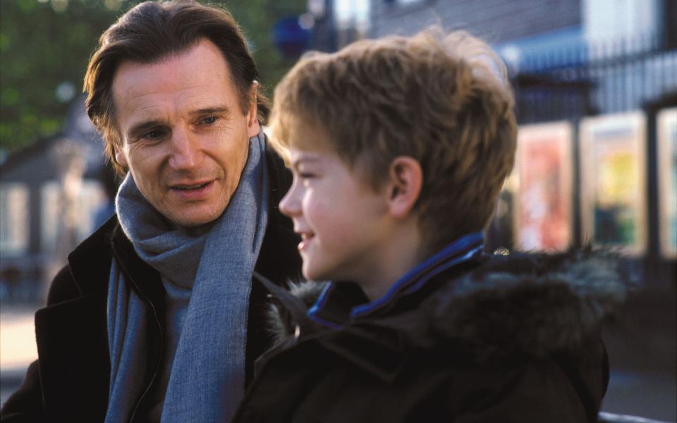 Liam Neeson and Thomas Brodie-Sangster in Love Actually - Credit: Universal Studios