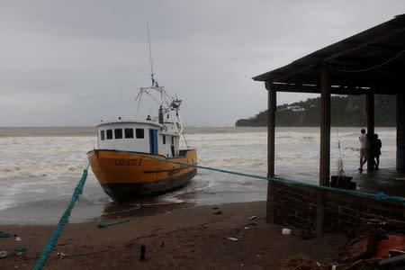 A boat is stranded on the shore of San Juan del Sur Bay after tropical storm Nate in San Juan del Sur, Nicaragua October 6,2017.REUTERS/Oswaldo Rivas