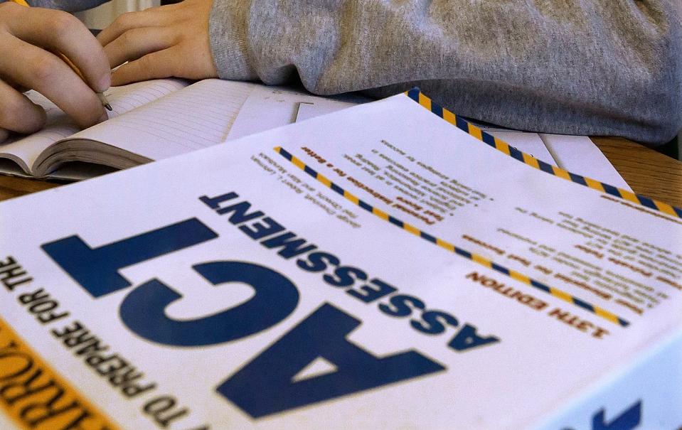 This April 1, 2014 file photo shows an ACT Assessment test in Springfield, Ill. The popular ACT college admissions exam is broadening how it reports student's scores.