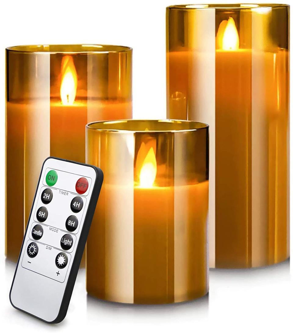 <br><br><strong>YFYTRE</strong> Led Flameless Glass Candle Set, Pack Of 3, $, available at <a href="https://amzn.to/3DBe4qN" rel="nofollow noopener" target="_blank" data-ylk="slk:Amazon" class="link ">Amazon</a>