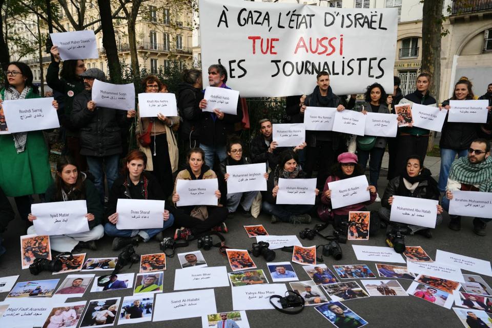 A large number of journalists have been killed in Palestinian territories. <a href="https://www.gettyimages.com/detail/news-photo/protestors-holding-a-banner-which-reads-as-in-gaza-the-news-photo/1775804380?adppopup=true" rel="nofollow noopener" target="_blank" data-ylk="slk:Dimitar Dilkoff/AFP via Getty Images;elm:context_link;itc:0;sec:content-canvas" class="link ">Dimitar Dilkoff/AFP via Getty Images</a>