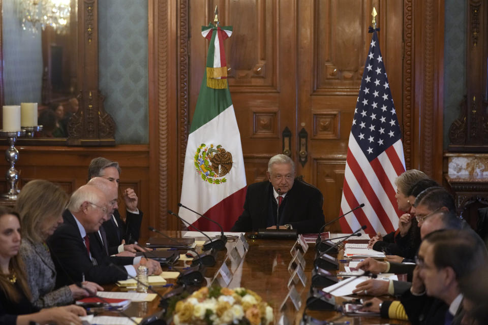 Mexican President Andrés Manuel López Obrador, center, meets with U.S. Secretary of State Antony Blinken, top left, partially covered, and his Secretary of Foreign Relations Alicia Barcena, top right, at the National Palace, the office and residence of the president, in Mexico City, Wednesday, Dec. 27, 2023. (AP Photo/Fernando Llano)
