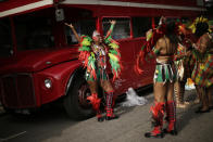 <p>Costumed revellers ahead of the parade during the Notting Hill Carnival in London, Monday, Aug. 27, 2018. The carnival has been held every year since 1966 and one of the largest festival celebrations of its kind in Europe. (Photo: Tim Ireland/AP) </p>