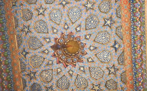 An ornate ceiling in Bukhara - Credit: WOLFGANG KAEHLER