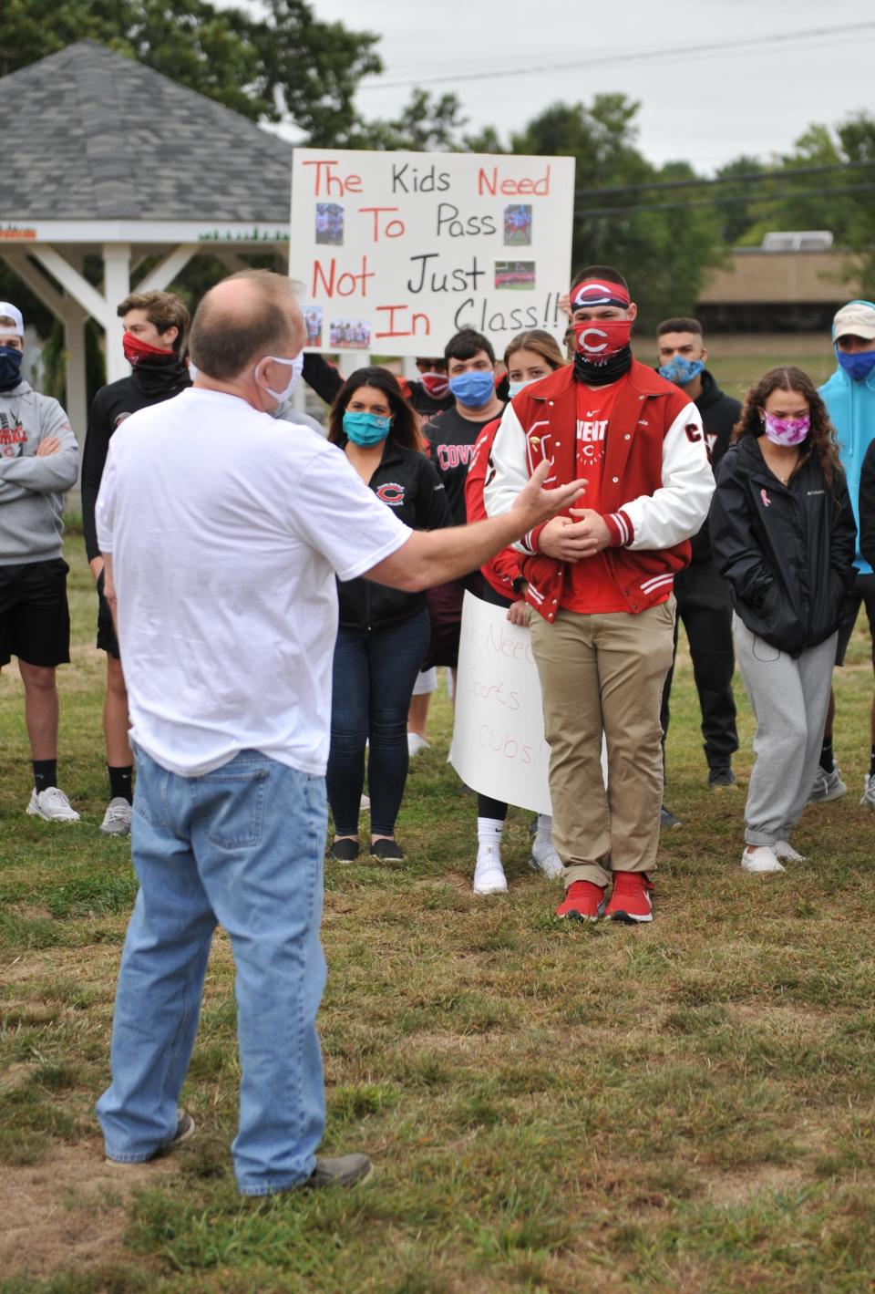 Coventry Superintendent Craig Levis speaks to students who gathered outside the town's public school's offices in 2021 protesting potential budget cuts that would eliminate sports and other after school activities.