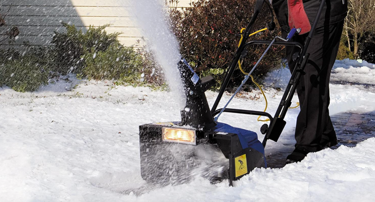 snow thrower, man using snow thrower to remove snow from yard, Amazon Prime Early Access Sale: Save $57 on Snow Joe Single-Stage Snow Thrower (Photo via Amazon)