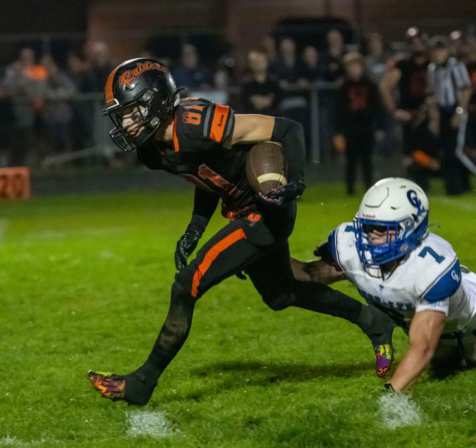 Almont’s Luke Winkler runs the ball up the field during a game earlier this season.