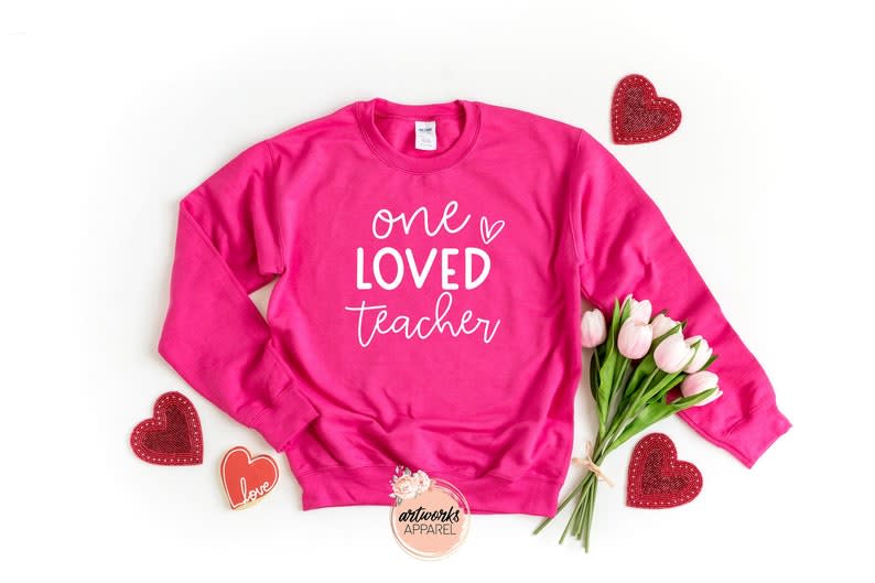 <p><a href="https://go.redirectingat.com?id=74968X1596630&url=https%3A%2F%2Fwww.etsy.com%2Flisting%2F941821559%2Fvalentines-sweatshirt-one-loved-teacher&sref=https%3A%2F%2Fwww.thepioneerwoman.com%2Fholidays-celebrations%2Fgifts%2Fg38711535%2Fteacher-valentine-gifts%2F" rel="nofollow noopener" target="_blank" data-ylk="slk:Shop Now;elm:context_link;itc:0;sec:content-canvas" class="link rapid-noclick-resp">Shop Now</a></p><p>'One Loved Teacher' Sweatshirt</p><p>etsy.com</p><p>$12.03</p><span class="copyright">DesignsByArtworks</span>