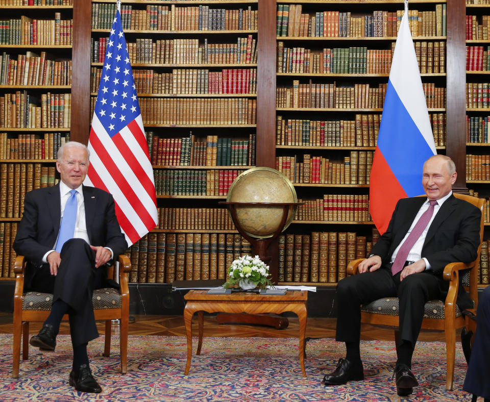 U.S. President Joe Biden, left, and Russia's President Vladimir Putin, right, pose for the media at Villa La Grange for the U.S.-Russia summit in Geneva, Switzerland, Wednesday, June 16, 2021. (Denis Balibouse/Pool Photo via AP)