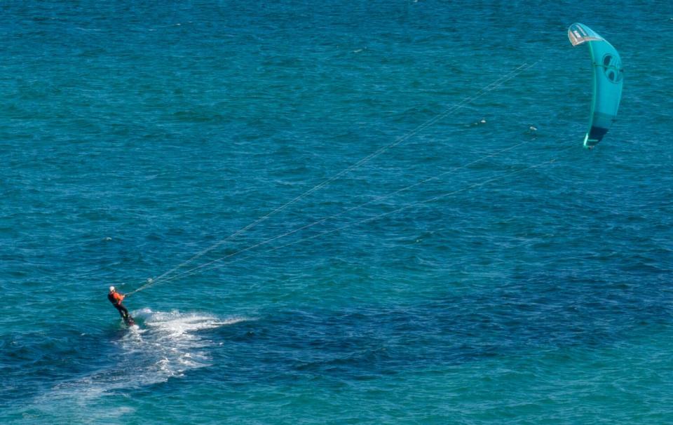 A kite surfer on the ocean