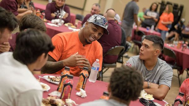 PHOTO: Houston Texans players visit the Uvalde high school football team on Sept. 1, 2022. (Todd Wawrychuk/ABC)