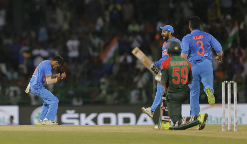 India’s Yuzvendra Chahal, left, celebrates the dismissal of Bangladesh’s Soumya Sarkar during the finals of Nidahas triangular Twenty20 cricket series in Colombo, Sri Lanka, Sunday, March 18, 2018. (AP Photo/Eranga Jayawardena)