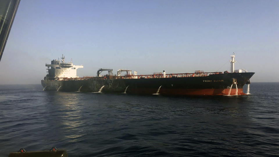 In this photo dated Thursday June 13, 2019, made available by the Norwegian shipowner Frontline, showing the crude oil tanker Front Altair after the fire aboard was extinguished onboard the Norwegian ship in the Gulf of Oman. The U.S. Navy rushed to assist the stricken vessels in the Gulf of Oman, off the coast of Iran, as two oil tankers came under suspected attack amid heightened tension between Iran and the U.S. (Frontline via AP)