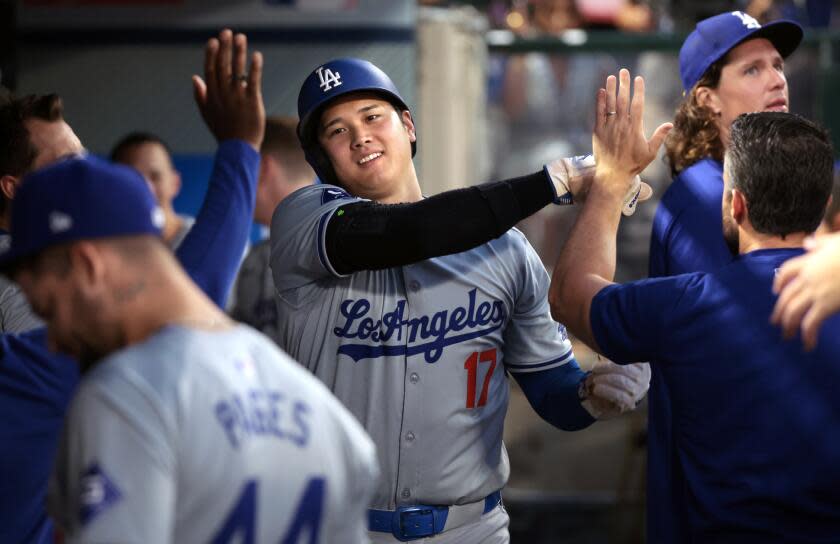 Anaheim, California September 3, 2024-Dodgers Shohei Ohtani celebrates after scoring a run against the Angels in the third inning at Anaheim Stadium Tuesday. (Wally Skalij/Los Angeles Times)