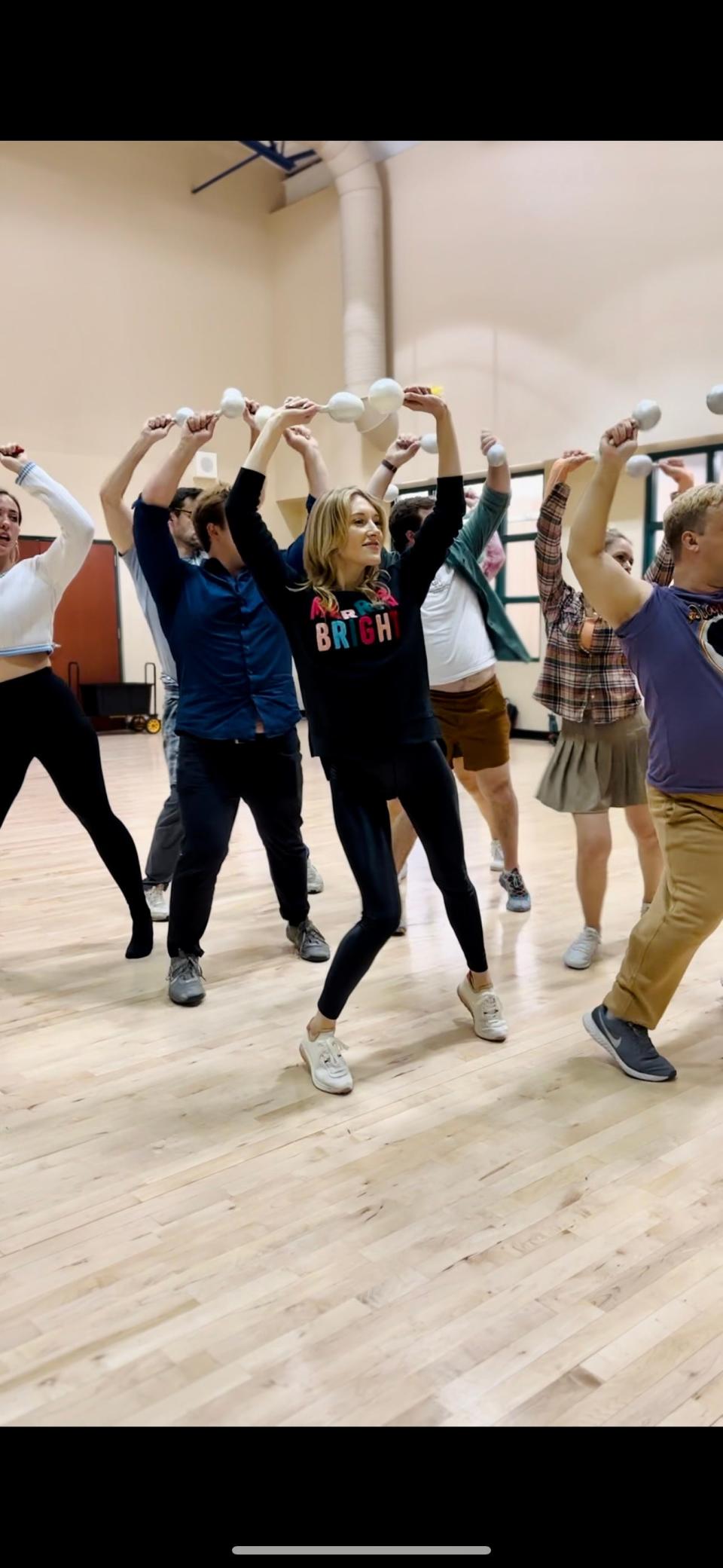 Lana Love (center) rehearses with TheatreZone's "Home for the Holidays" cast on Monday, Dec. 6.