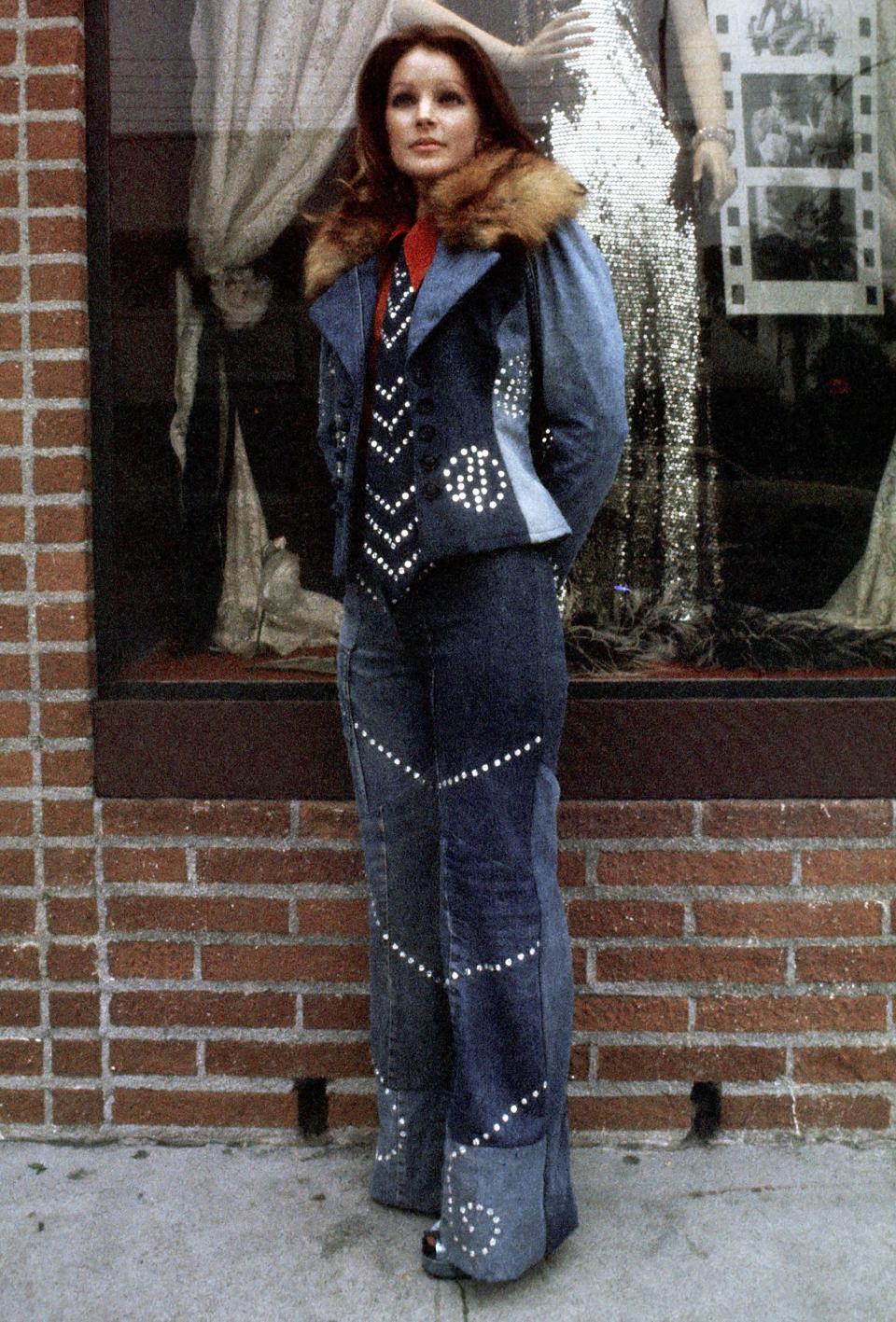 Presley rocked a denim outfit as she posed outside her clothing shop, Bis & Beau Boutique, in Beverly Hills, California. (Ron Galella / Getty Images)