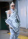 <p>A guest is seen wearing a money clip outfit outside the Taoray Wang show. <em>[Photo: Getty]</em> </p>