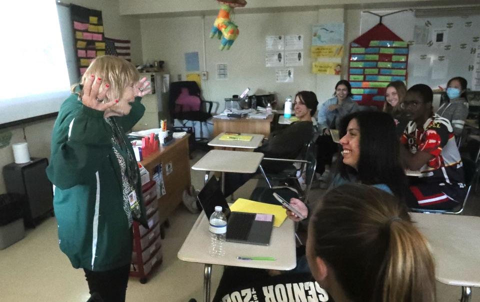 DeLand High School Spanish teacher Jeanne Jendrzejewski, gestures with her hands as she walks and talks with students while they work on a lesson, Thursday, Jan. 25, 2023.