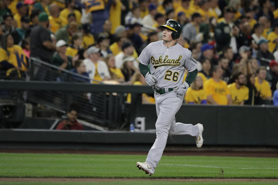 Oakland Athletics' Matt Chapman runs the bases after hitting a two-run home run during the second inning of the team's baseball game against the Seattle Mariners, Thursday, Sept. 26, 2019, in Seattle. (AP Photo/Ted S. Warren)