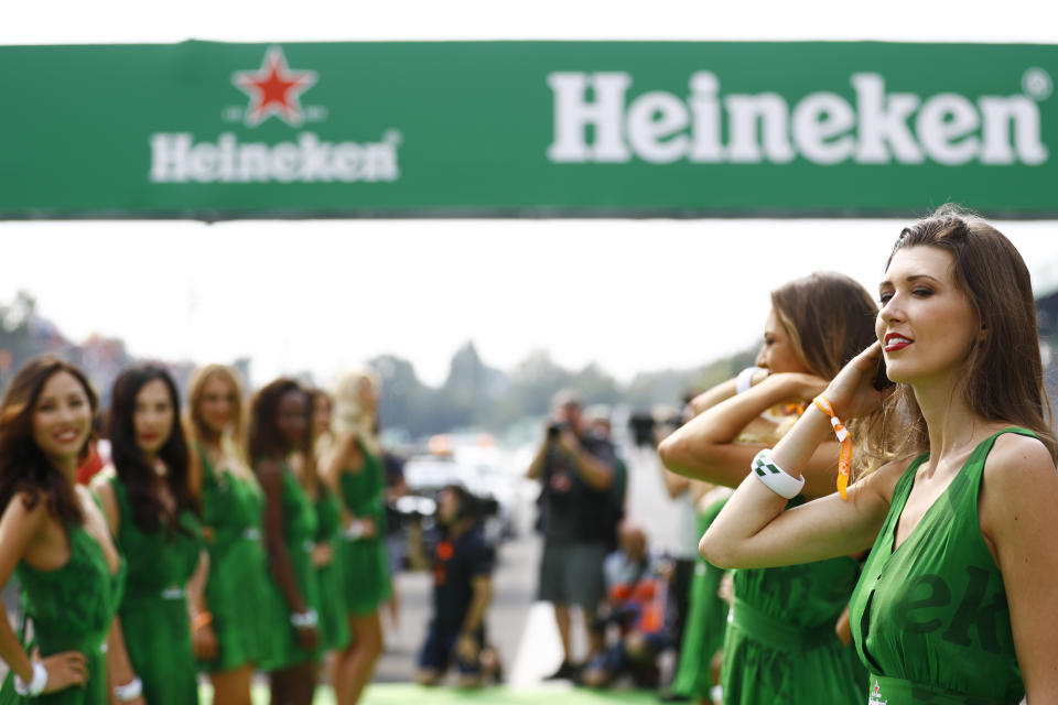 It starts with He, not She: Heineken’s grid girls in their unmistakeable outfits