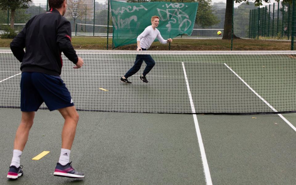  Daily Telegraph Boudicca Fox Leonard is having a beginners tennis lesson with LTA coach Sam Richardso -  Rii Schroer