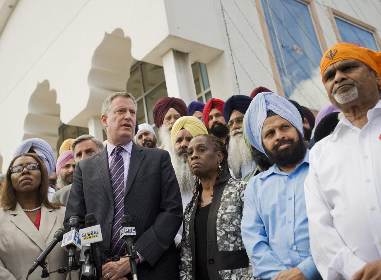 Public Advocate Bill de Blasio and wife Chirlane McCray joins the Sikh Cultural Society in Queens to condemn the then-recent alleged hate crime against Sikh professor Dr. Prabhjot Singh.