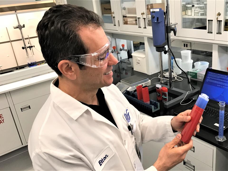 Scientist Elton Menon works on prototype of the next generation of Old Spice deodorant at P&G's Mason Business Center. The facility is the company's largest R&D center in the world.