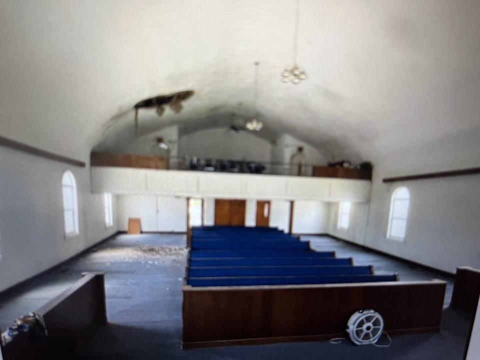 The sanctuary of the vacant Shiloh Missionary Baptist Church in Daytona Beach's Midtown neighborhood is in rough shape. Part of the ceiling appears to have broken apart and fallen to the floor. The city has purchased the property with hopes of redeveloping the site.