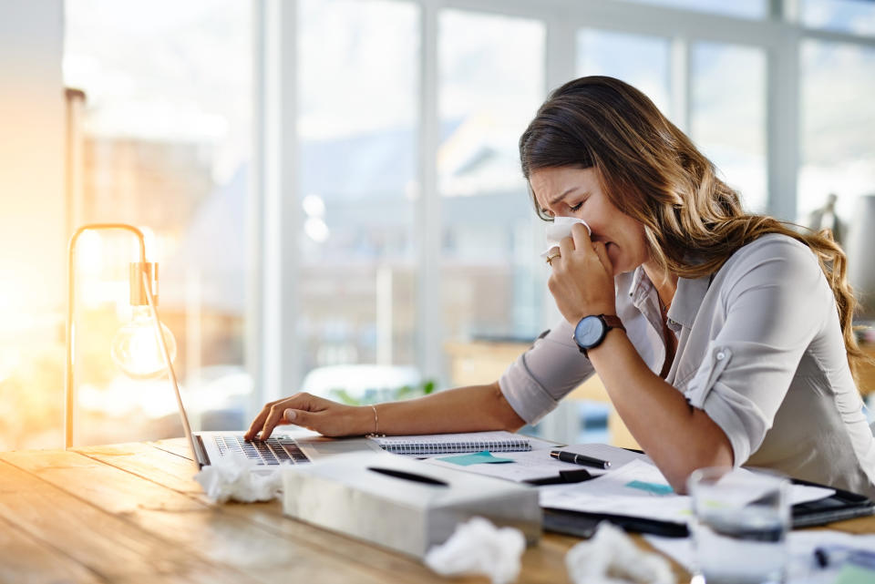 Coming to work when sick is a bad idea. Photo: PeopleImages/Getty