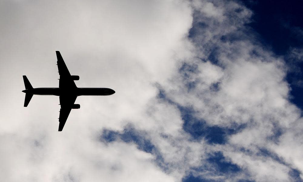 Aeroplane flying through clouds