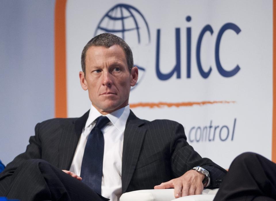 Lance Armstrong listens at the World Cancer Congress in Montreal Wednesday, Aug. 29, 2012. 