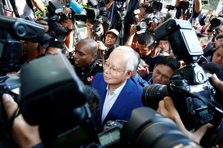 Malaysia's former prime minister Najib Razak arrives to give a statement to the Malaysian Anti-Corruption Commission (MACC) in Putrajaya, Malaysia May 22, 2018. REUTERS/Lai Seng Sin