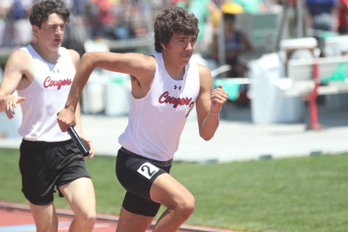 Crestview's Gabe Smedley competes in the boys 4x400 relay during the Division III state track and field meet Friday at Jesse Owens Memorial Stadium in Columbus.