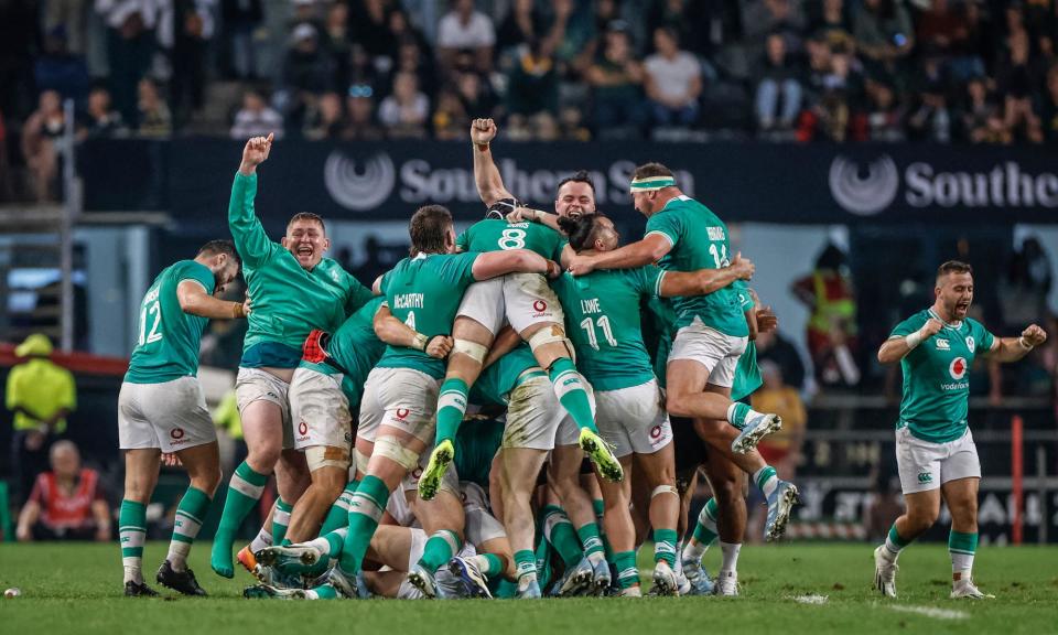 <span>Ireland's players celebrate after winning the second Test in thrilling style against the Springboks.</span><span>Photograph: Phill Magakoe/AFP/Getty Images</span>