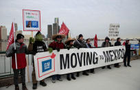 General Motors assembly workers and supporters protest GM's announcement to close its Oshawa assembly plant during a Unifor union rally across the Detroit River from GM's headquarters, in Windsor, Ontario, Canada January 11, 2019. REUTERS/Rebecca Cook