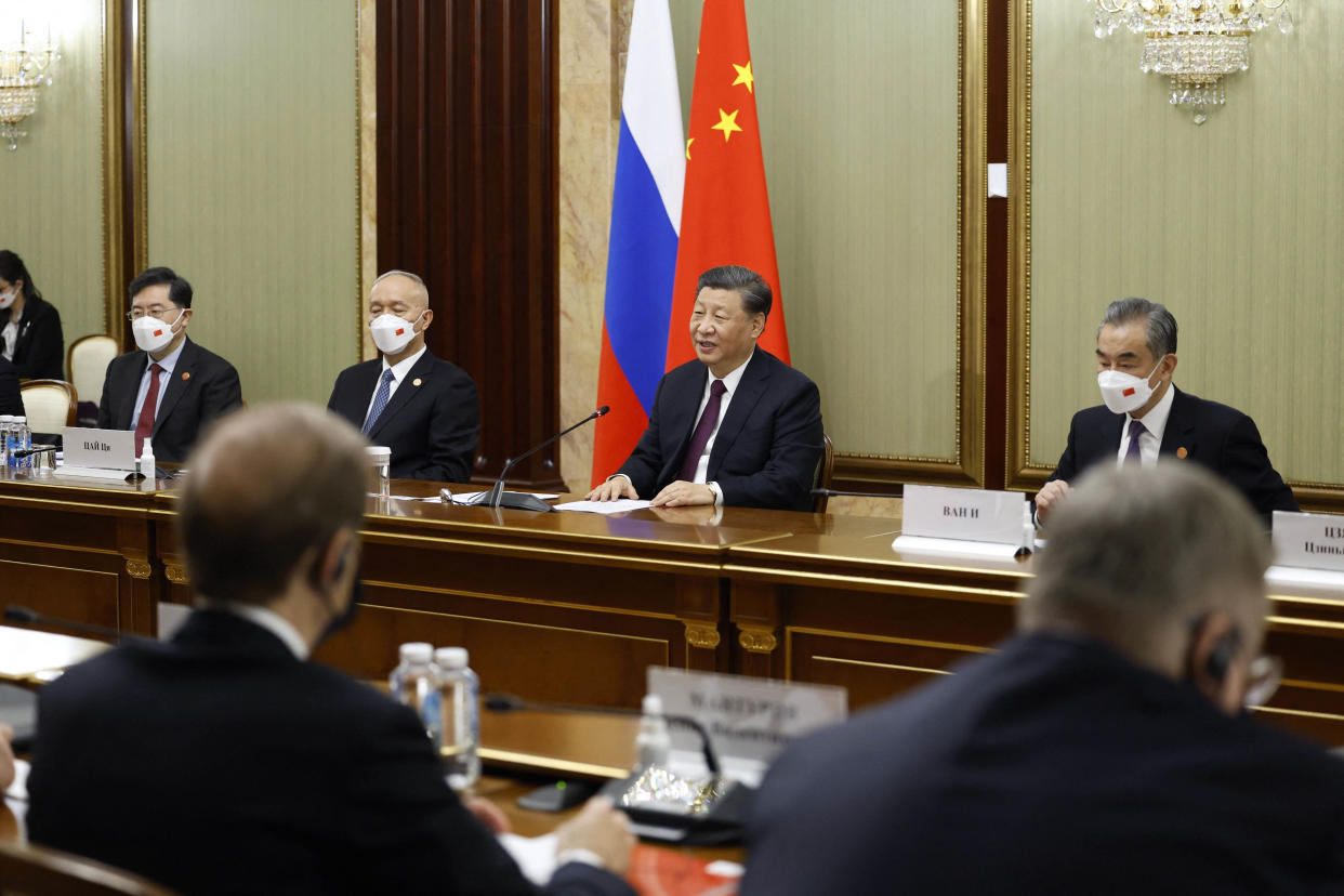 Xi Jinping during a meeting with the Russian prime minister in Moscow on Tuesday. (Dmitry Astakhov / AFP - Getty Images)